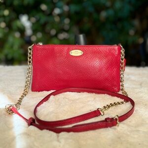 Coach mini crossbody bag with hangtag.